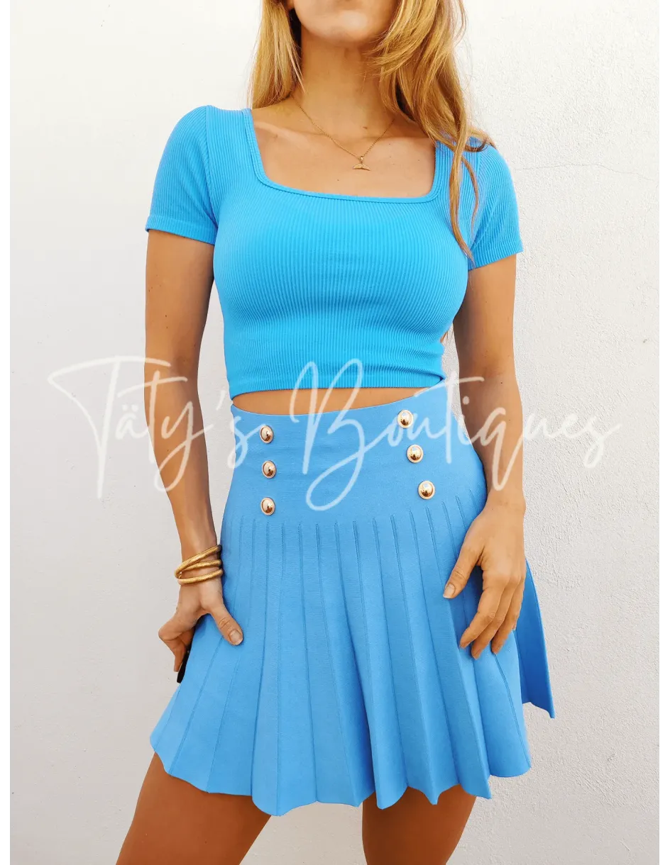 Falda tablas botones dorados | Täty's Boutiques - Grupo Puerto Gragera